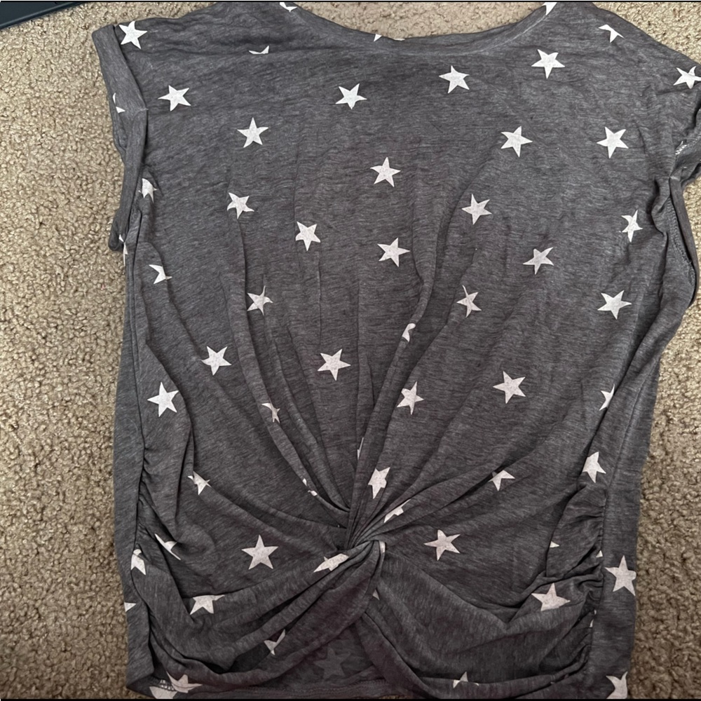 Runs a little small. Gray and white/silver stars.